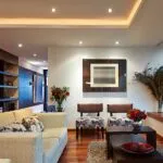 modern living room with spot lights 150x150 - شريط ليد للسقف: إضاءة مبتكرة تعزز الجمال والأداء