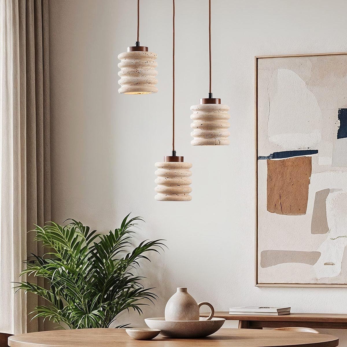 3-flammige-zylinder-haengelampe-alva-aus-travertin Round Stone Pendant Light - Image 1